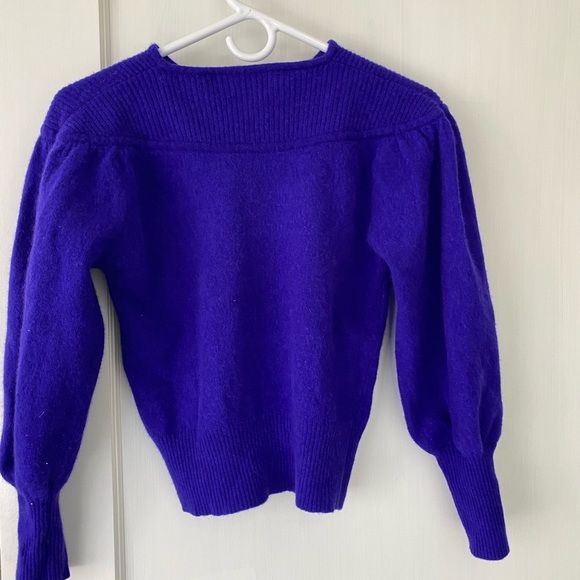 Super cute wool sweater!! Has a minor whole is the front. - Picture 2 of 4